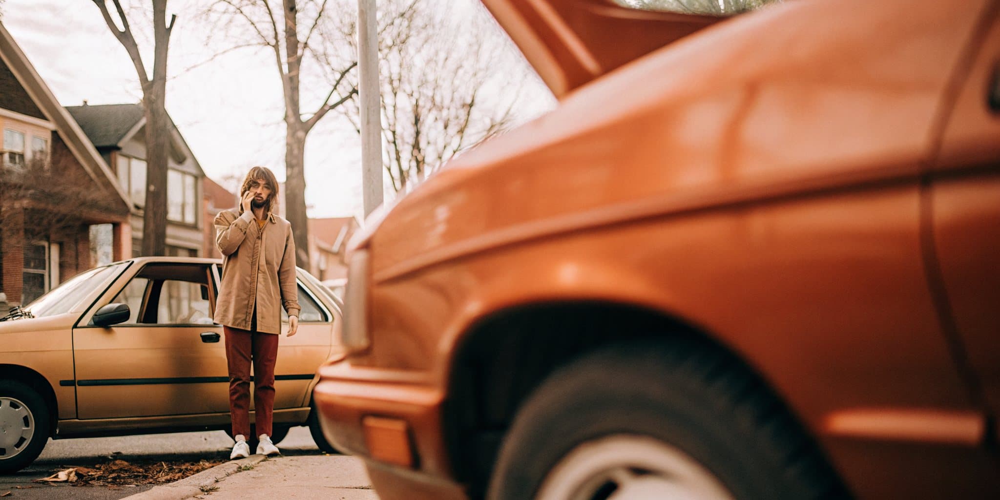 A person being supported and reassured after a car accident